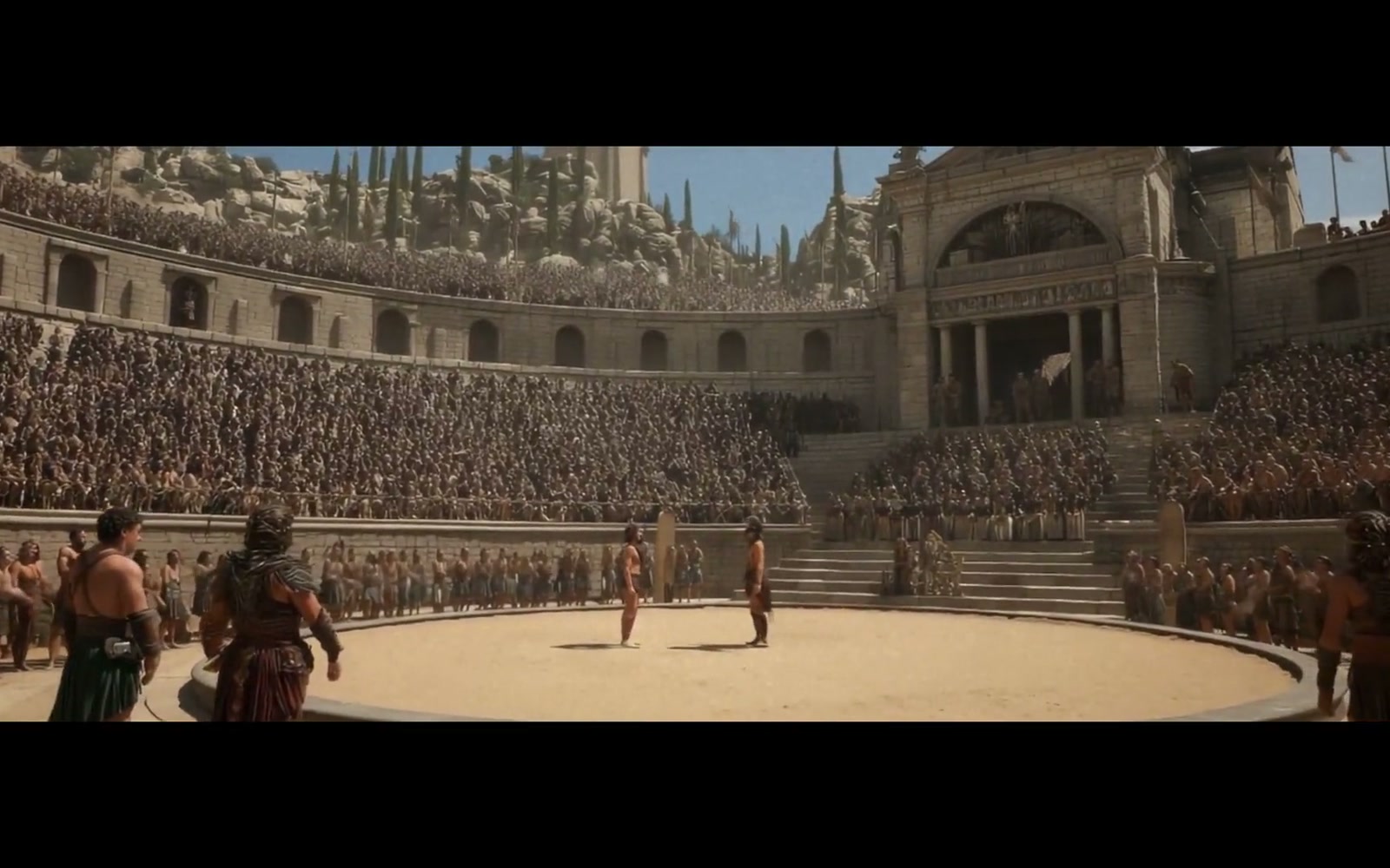 Milo carrying a bull inside an ancient arena